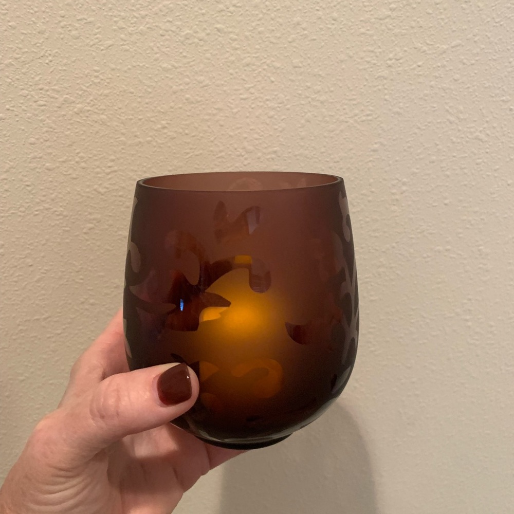 Pair (2) of plum colored elegant candle holders.